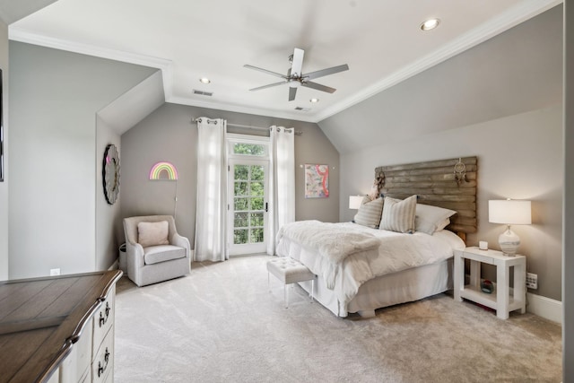 carpeted bedroom featuring ceiling fan, crown molding, and lofted ceiling