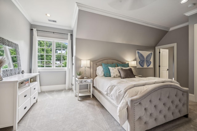 carpeted bedroom featuring vaulted ceiling and ornamental molding