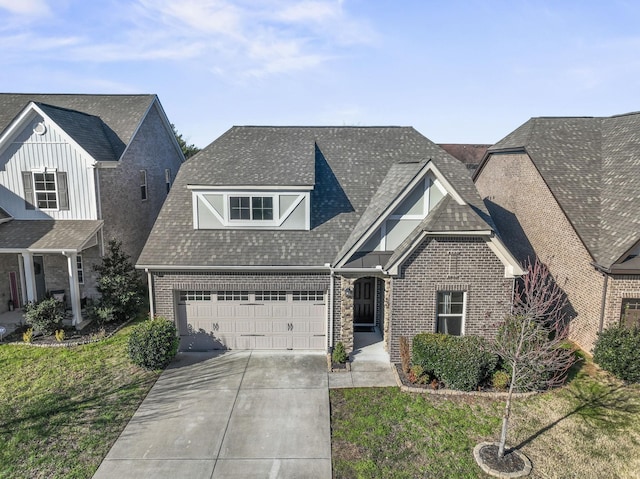 view of front of home with a garage and a front lawn