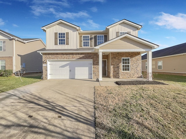 view of front of home with a porch, a garage, and a front lawn