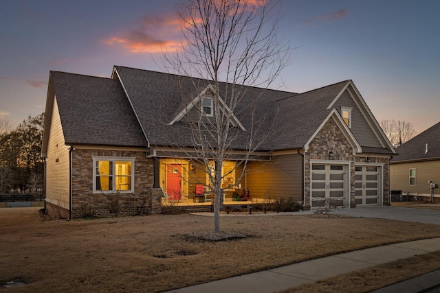 craftsman inspired home featuring a garage