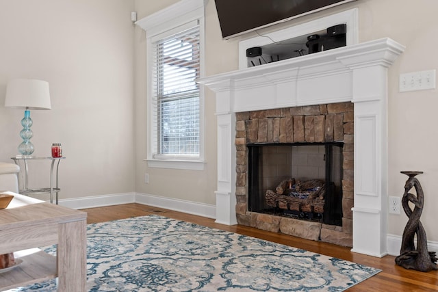 interior space featuring a wealth of natural light and hardwood / wood-style floors