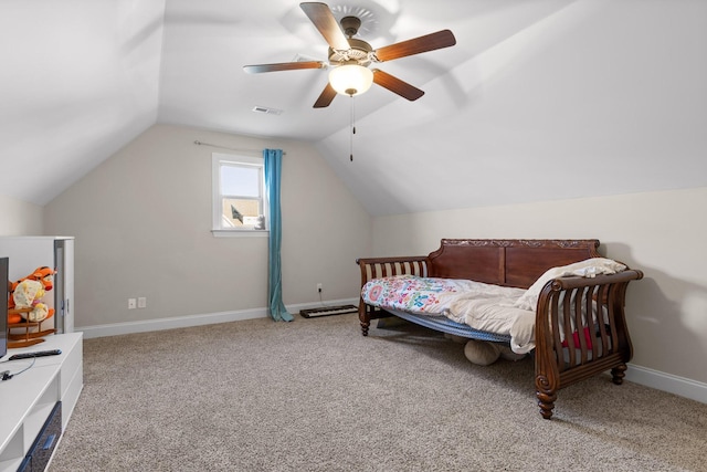 carpeted bedroom with vaulted ceiling and ceiling fan