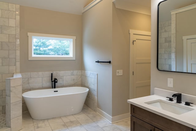 bathroom featuring tile walls, vanity, and shower with separate bathtub