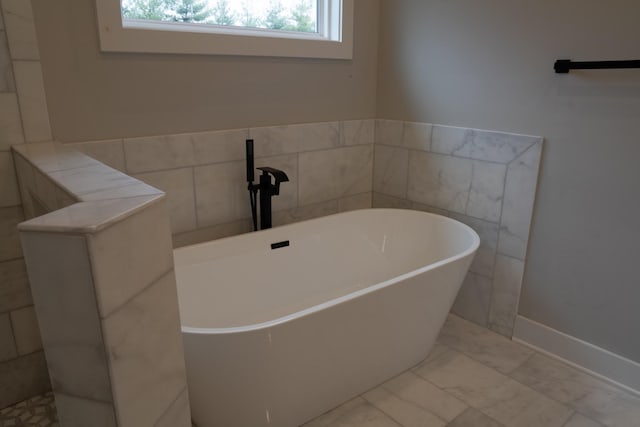 bathroom featuring a bathtub