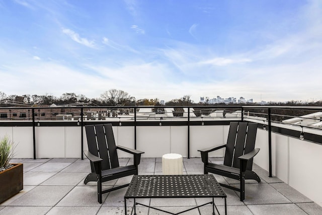 view of patio with a balcony