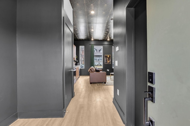 corridor featuring light hardwood / wood-style flooring