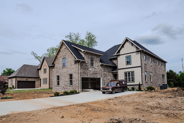 view of front of home with cooling unit