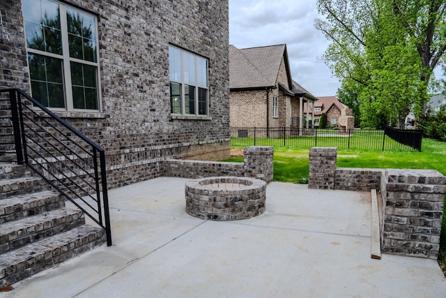 view of patio featuring a fire pit