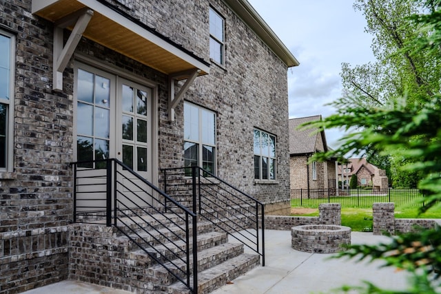 entrance to property with a patio area