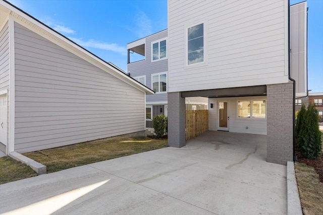 rear view of house with a carport