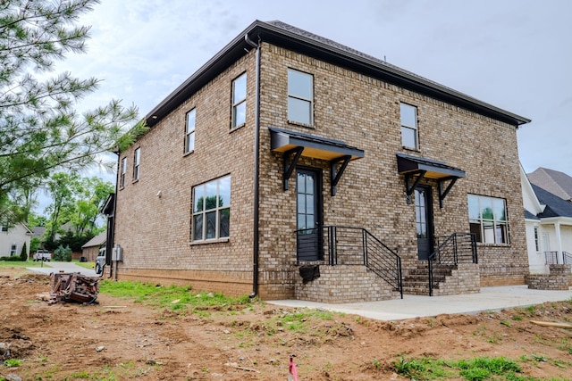 view of home's exterior with a patio area