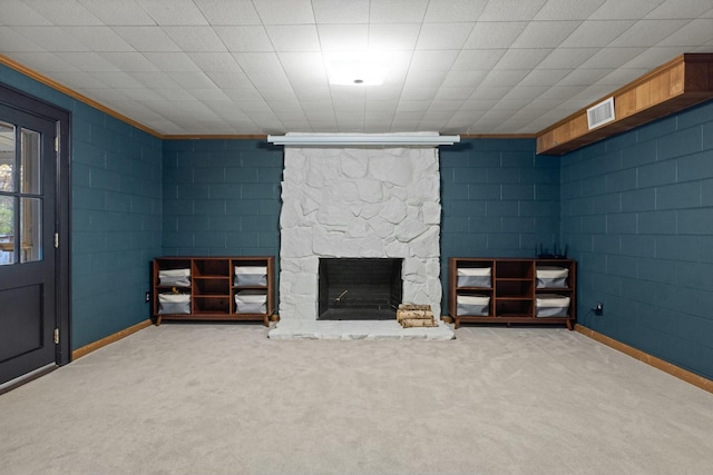 sitting room featuring a fireplace, light carpet, and ornamental molding