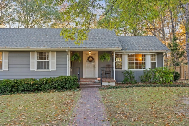 single story home with a front yard