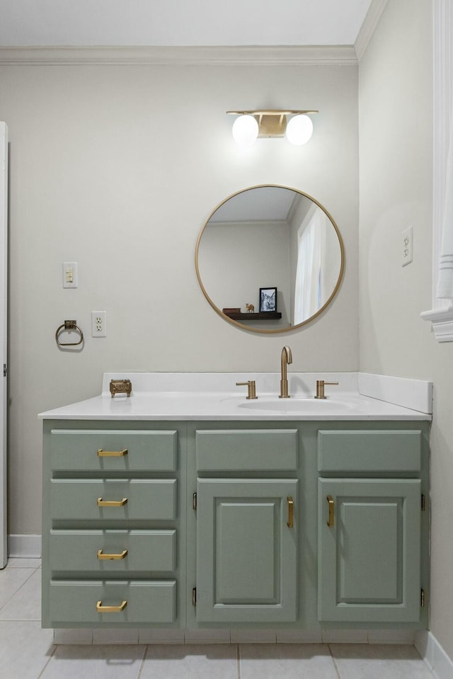 bathroom with tile patterned floors, ornamental molding, and vanity