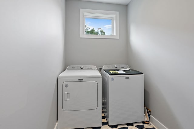 laundry area with washer and clothes dryer