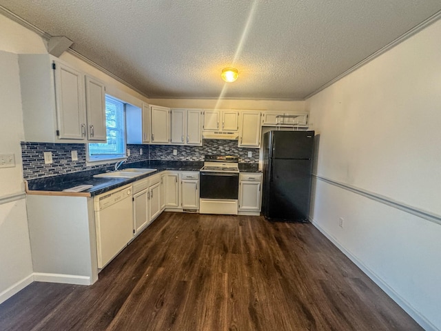 kitchen with dark wood-style floors, white dishwasher, freestanding refrigerator, a sink, and electric stove