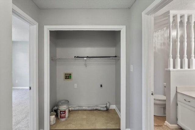 laundry room featuring laundry area, washer hookup, and electric dryer hookup