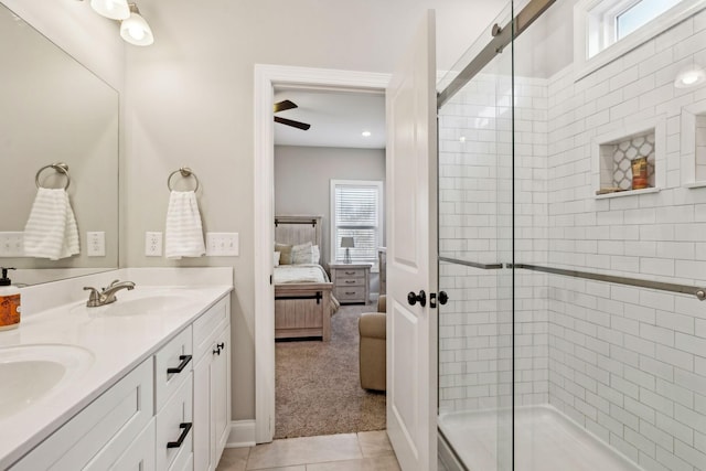 bathroom with vanity, tile patterned floors, and walk in shower