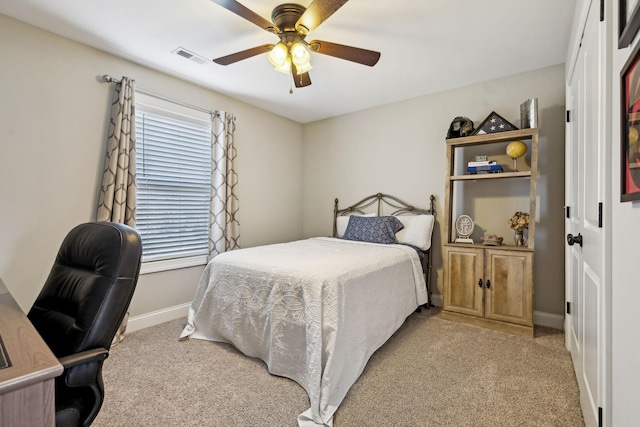 carpeted bedroom featuring ceiling fan