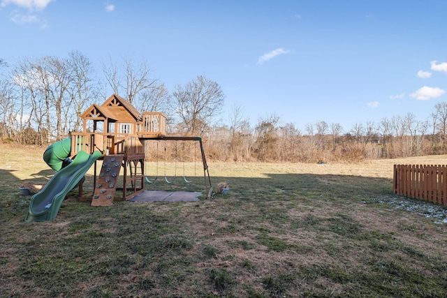 view of jungle gym with a lawn