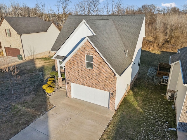 view of front of house featuring a garage and a front yard