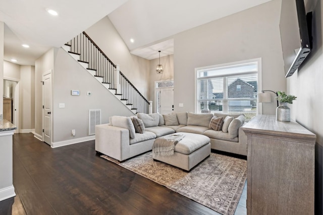 living room featuring dark hardwood / wood-style floors