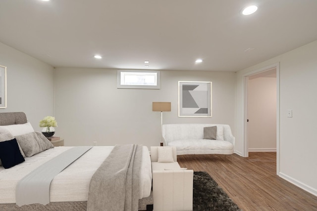 bedroom featuring hardwood / wood-style floors