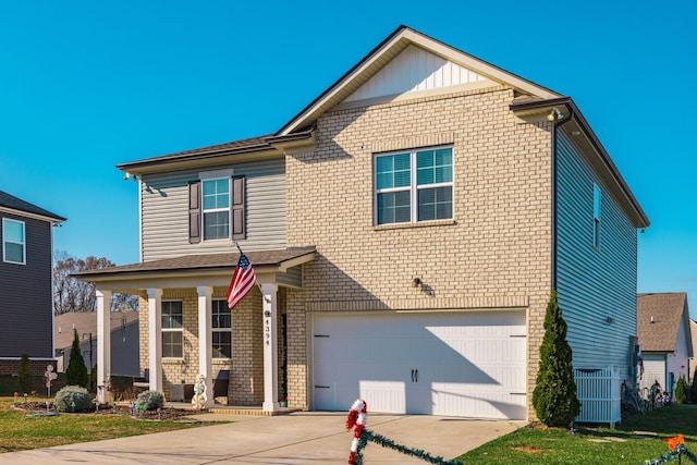 front of property with central air condition unit and a garage