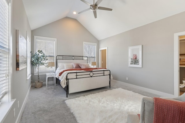 carpeted bedroom with lofted ceiling and ceiling fan