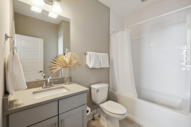 full bathroom featuring vanity, toilet, tile patterned floors, and shower / bathtub combination with curtain