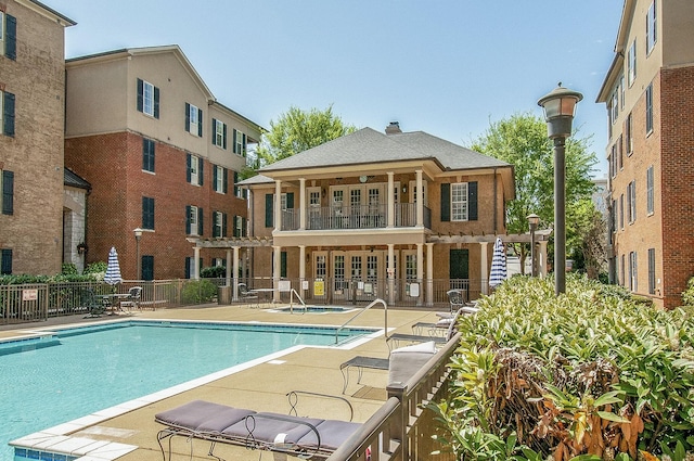 view of pool featuring a patio