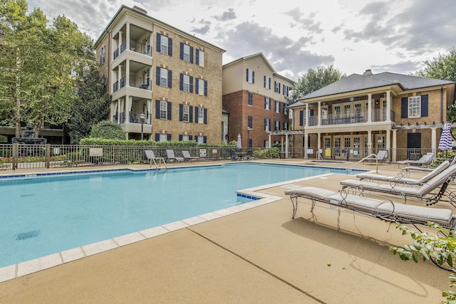 view of pool featuring a patio