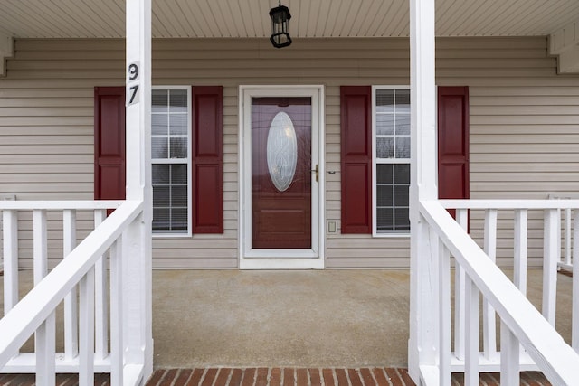 entrance to property with covered porch