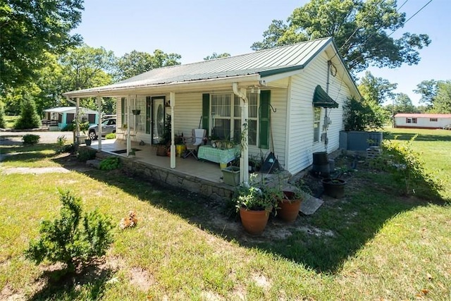 exterior space featuring a patio and a front yard