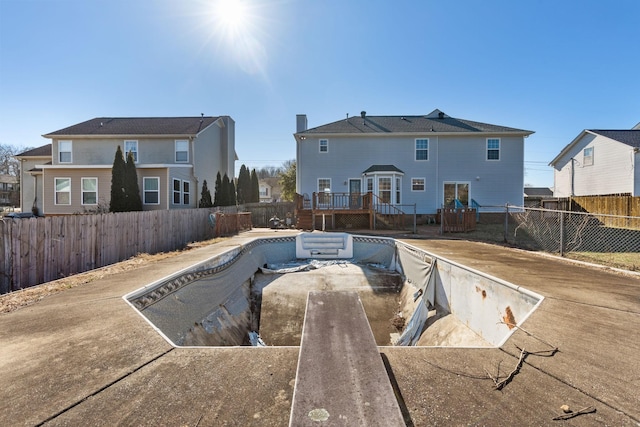 view of pool featuring a wooden deck