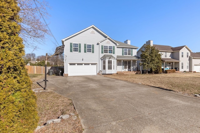 front of property with a garage