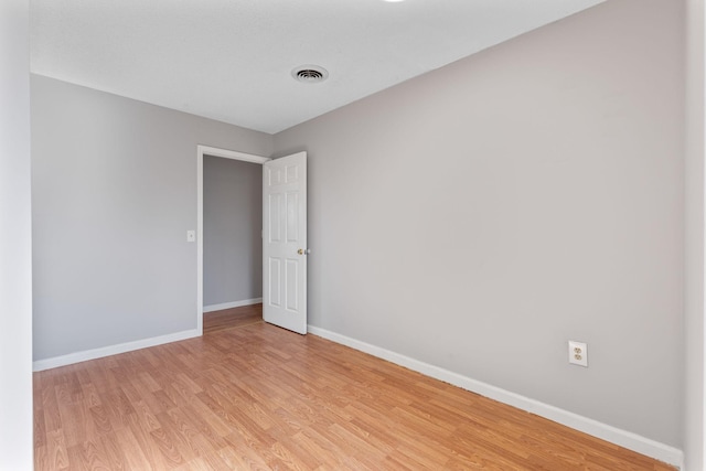 empty room featuring light hardwood / wood-style floors