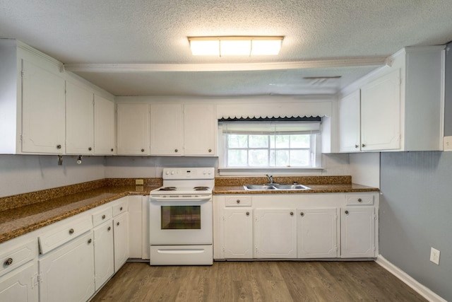 kitchen featuring white cabinetry, electric range, light hardwood / wood-style floors, sink, and dark stone counters