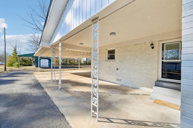 view of patio featuring a carport