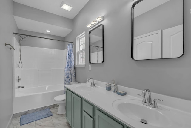 full bathroom featuring shower / bath combo with shower curtain, toilet, and vanity