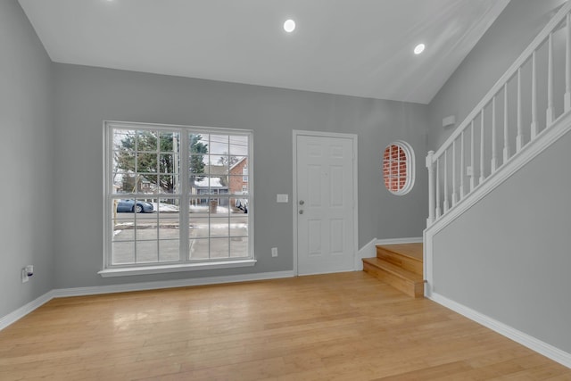 foyer entrance with light wood-type flooring