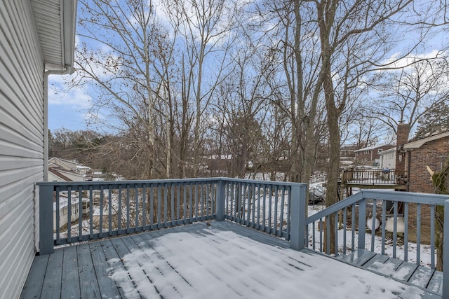 view of snow covered deck