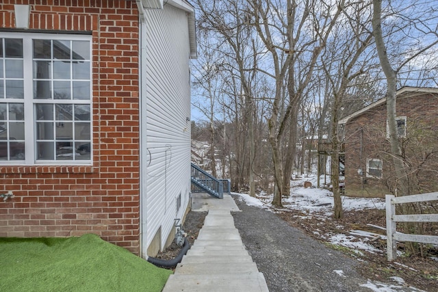 view of snow covered property