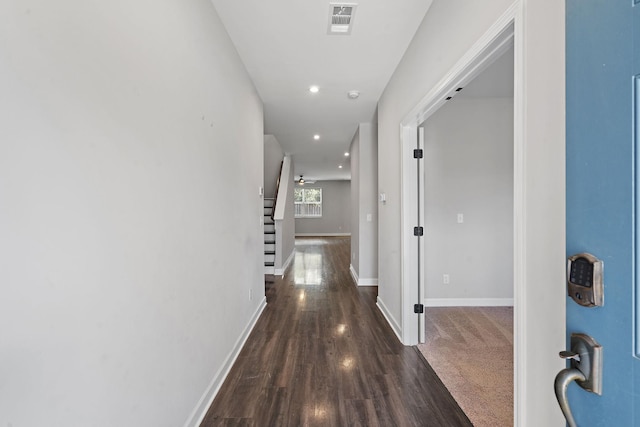 hall with dark hardwood / wood-style floors