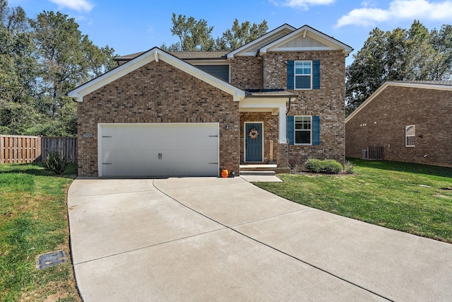 craftsman inspired home with a garage, cooling unit, and a front lawn