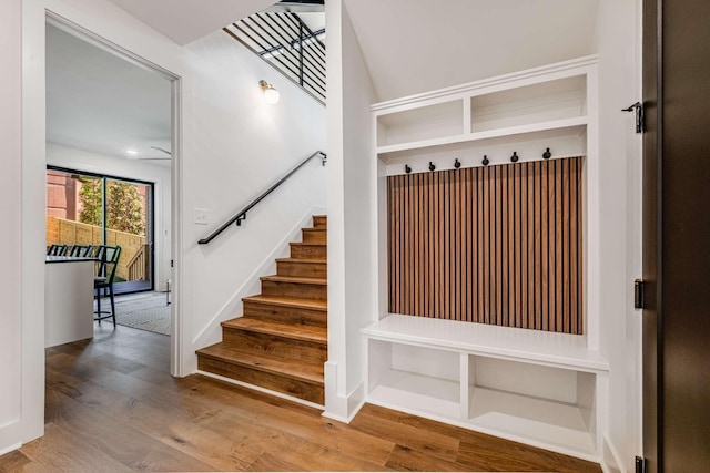 mudroom featuring baseboards and wood finished floors