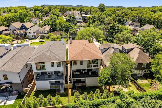 birds eye view of property with a residential view