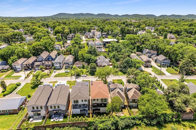 aerial view featuring a residential view and a view of trees