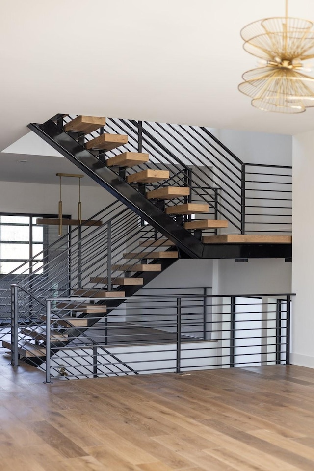 stairs with wood finished floors